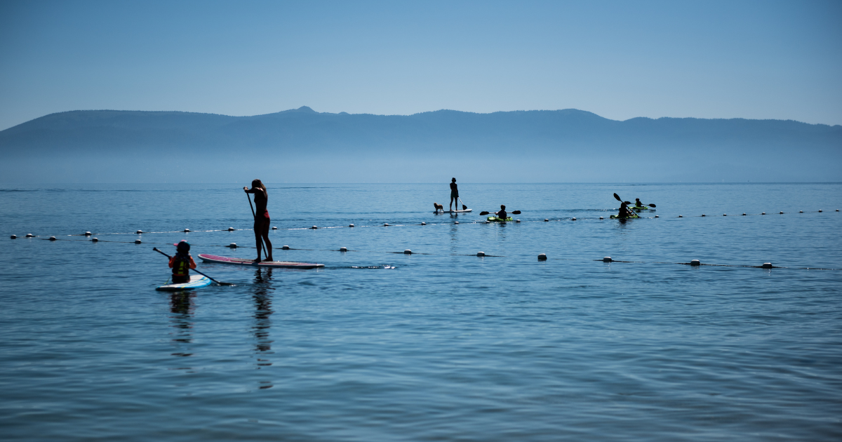 people paddle boarding at lake tahoe
