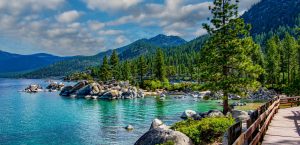 turquoise water and pine trees at Sand Harbor State Park