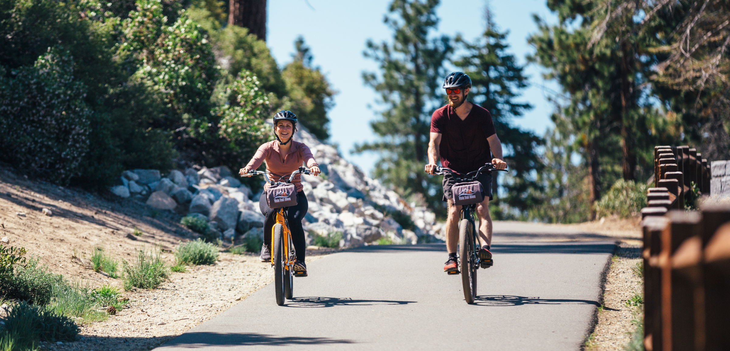 couple enjoying a bike ride in lake tahoe